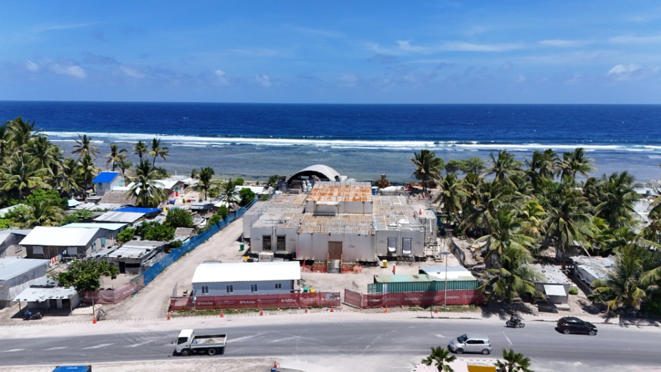 Aerial view of the Tarawa Kiribati Temple under construction near the Pacific coastline in March 2026.